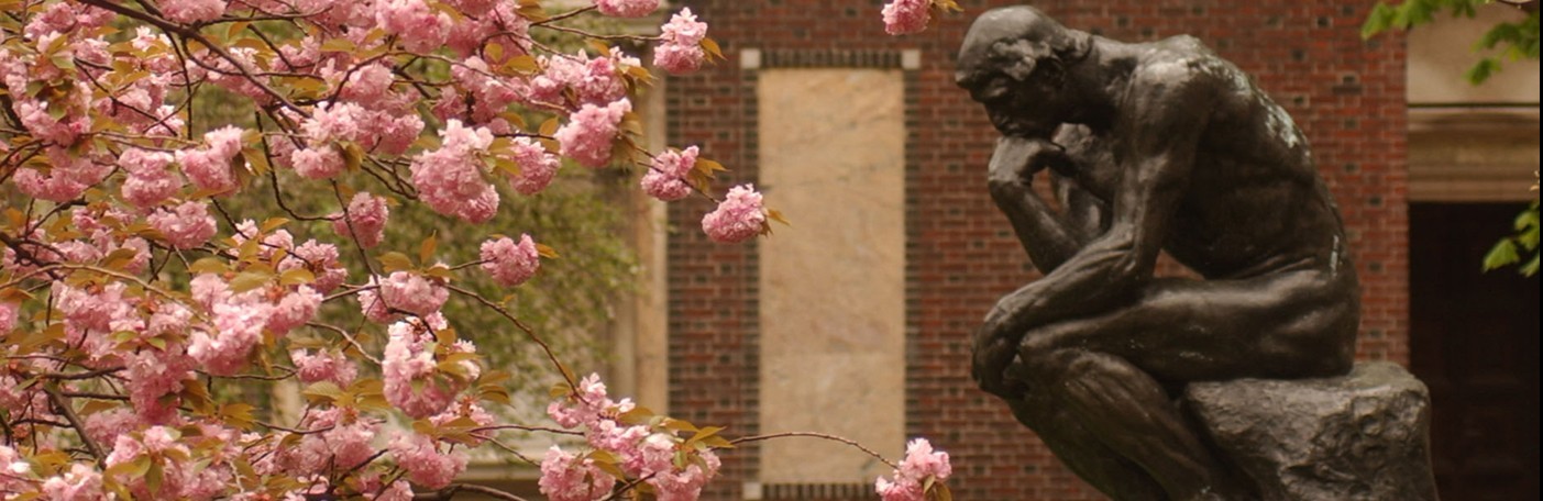Photograph of The Thinker statue outside of Philosophy Hall